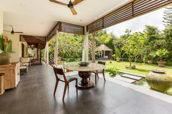 Dining Area In Front Of Fish Pond