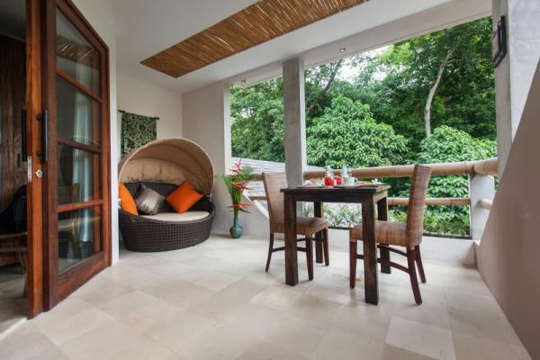 Sitting Area And Day Bed At Balcony