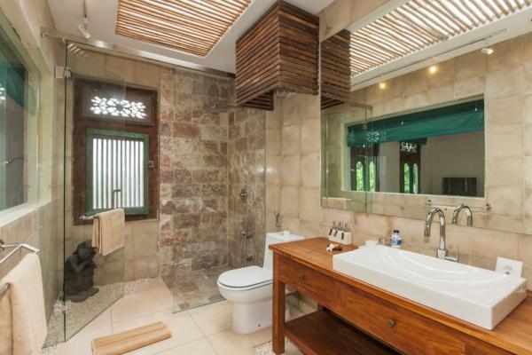 Indoor Shower With Glass Door And Single Basin