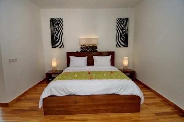 Bedroom 1 With Wooden Floor And Double Size Bed