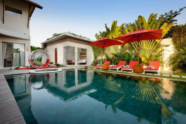 Swimming Pool Area With Sun Loungers & Umbrellas Design With Red Color