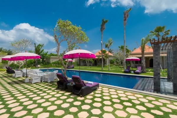 Chairs And Table By The Pool