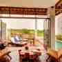 Open Style Living Area Overlooking The Lap Pool