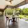 Dining Area In Front Of Fish Pond