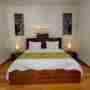 Bedroom 1 With Wooden Floor And Double Size Bed