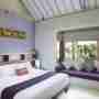 Kingsize Bed Plus Day Bed In The Purple Painted Bedroom