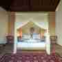 The Wooden Floored Room With Canopied Wooden Bed